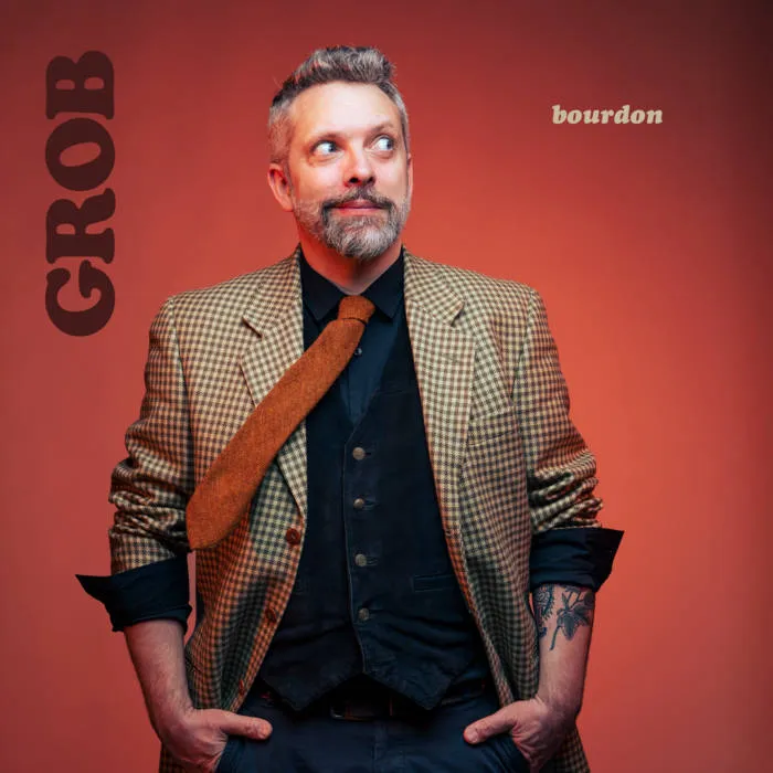 Grob — Sa cape